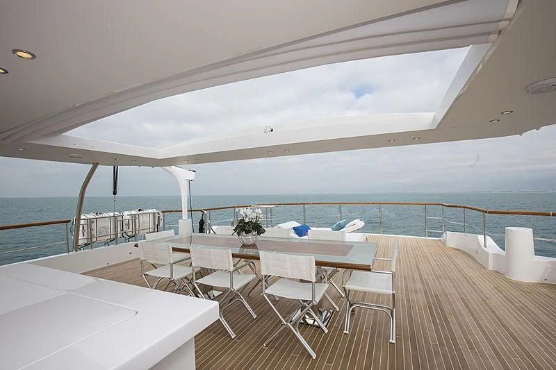 a room with a table and chairs on a boat aboard JODI ANN Yacht for Charter
