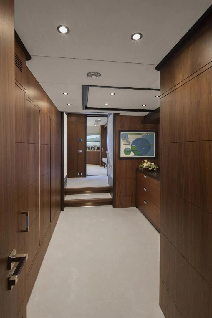 a hallway with wood cabinets aboard JODI ANN Yacht for Charter
