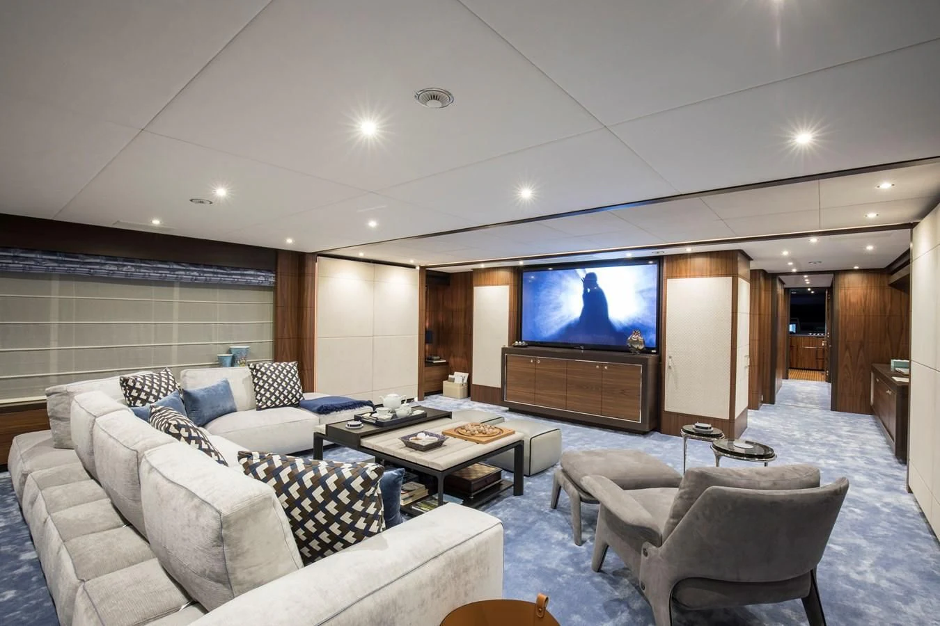 a living room with a tv and couches aboard JODI ANN Yacht for Charter