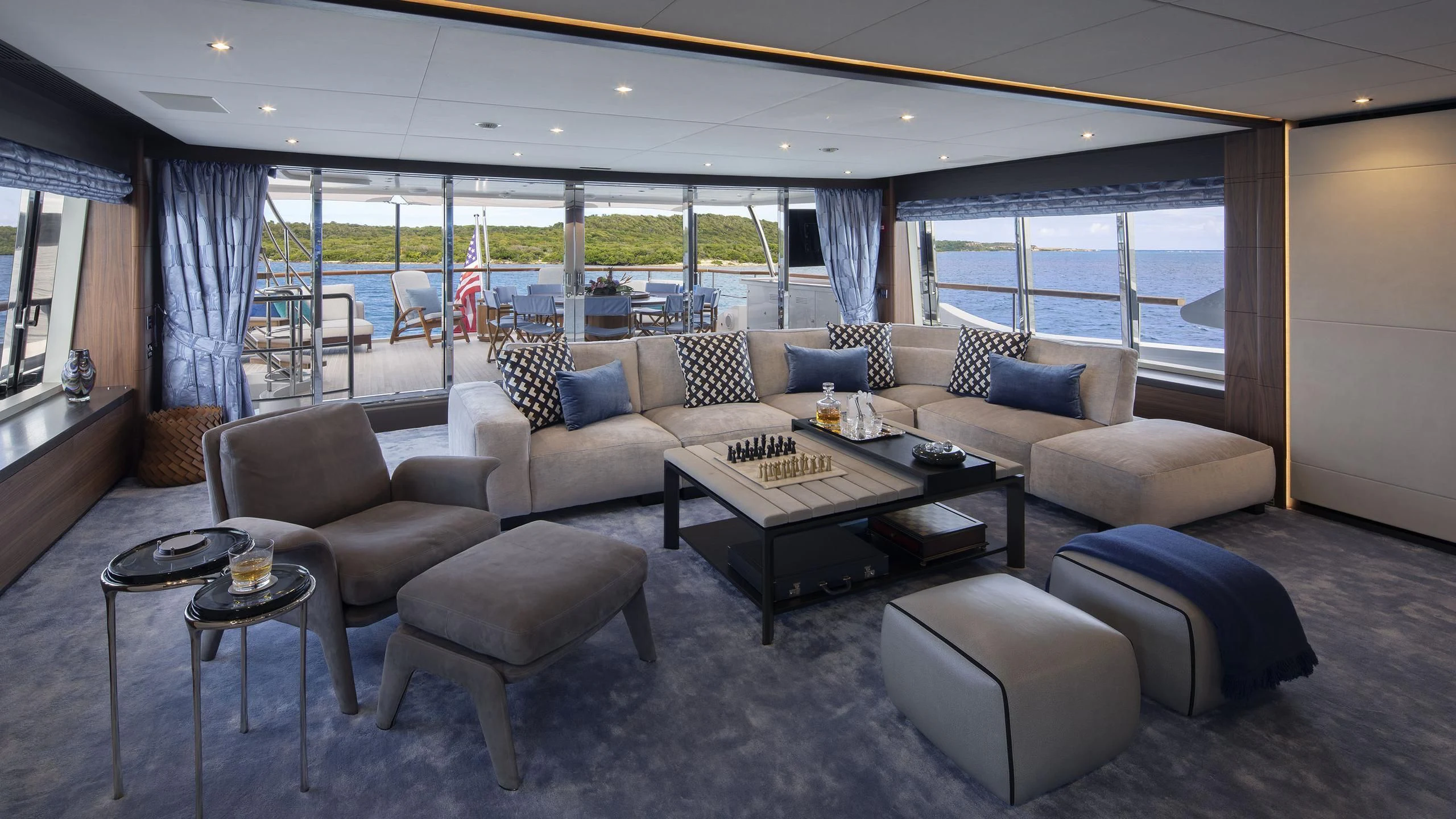 a living room with a couch and a coffee table aboard JODI ANN Yacht for Charter