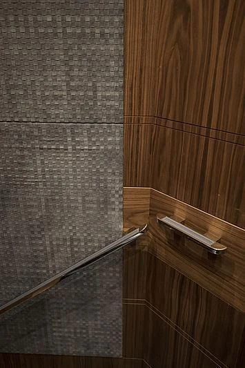 a wooden surface with a metal handle aboard JODI ANN Yacht for Charter