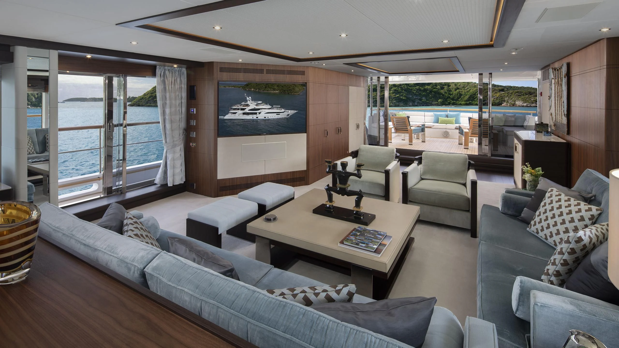 a living room with a large window aboard JODI ANN Yacht for Charter