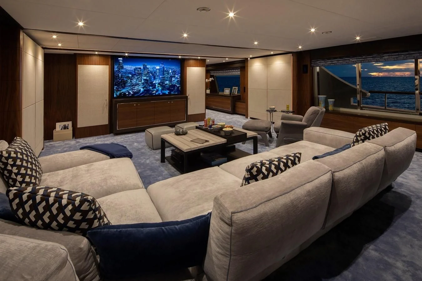 a living room with a large window aboard JODI ANN Yacht for Charter