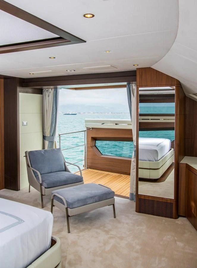 a bedroom with a view of the ocean aboard JODI ANN Yacht for Charter