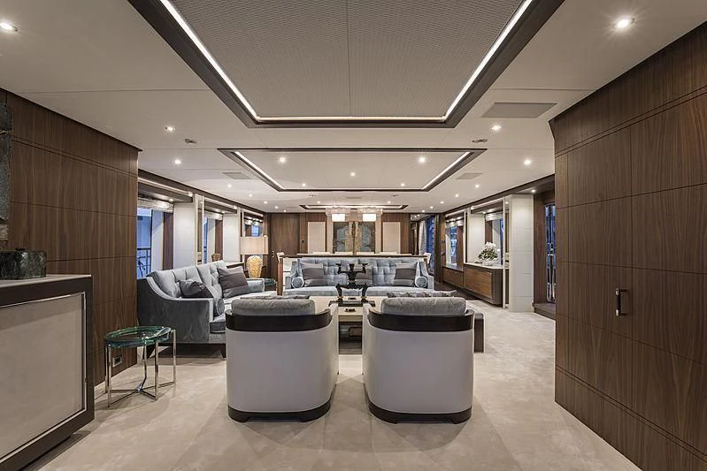 a living room with a large screen aboard JODI ANN Yacht for Charter