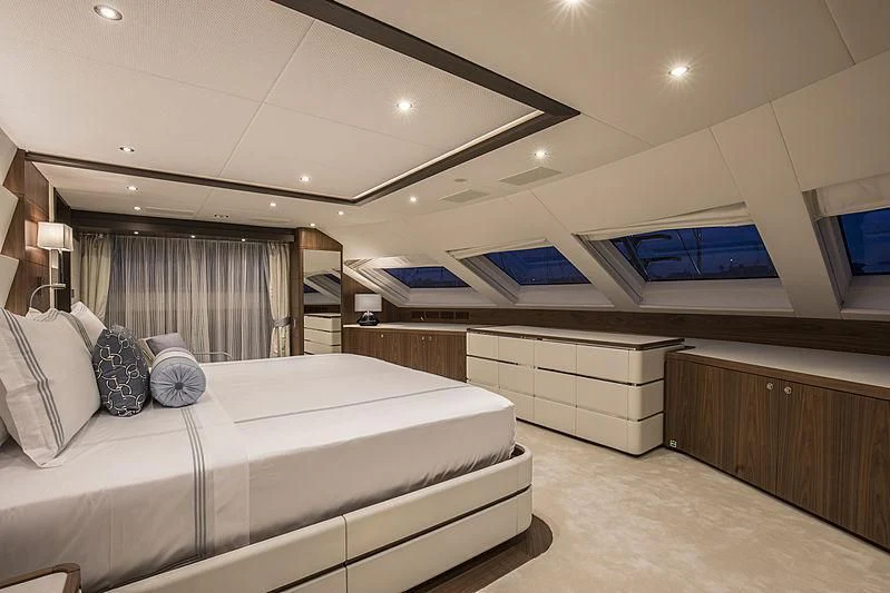 a room with a bed and a desk aboard JODI ANN Yacht for Charter