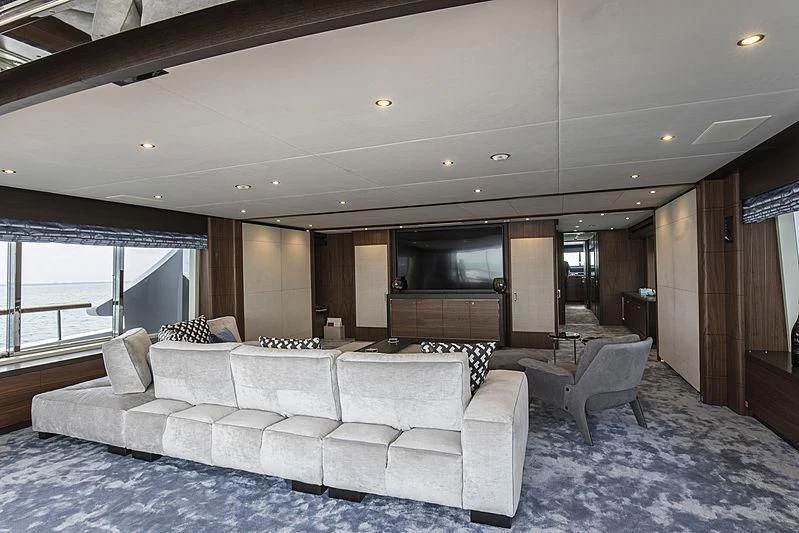 a large living room with a large window aboard JODI ANN Yacht for Charter