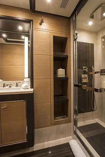 a bathroom with a glass shower aboard JODI ANN Yacht for Charter