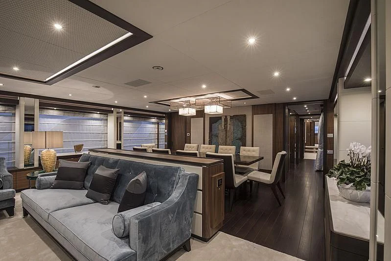a living room with a couch and a table aboard JODI ANN Yacht for Charter