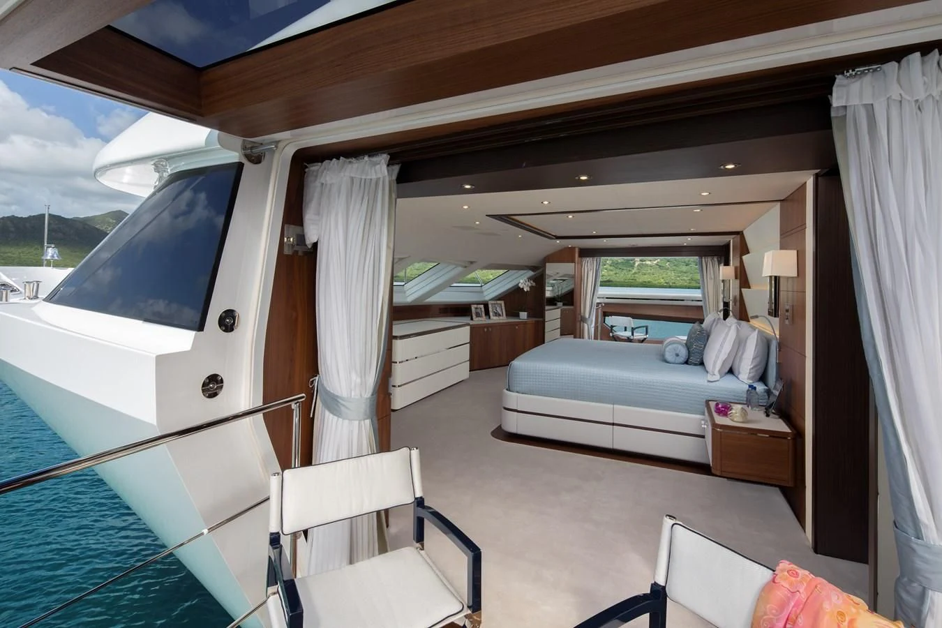 a room with a bed and a couch aboard JODI ANN Yacht for Charter
