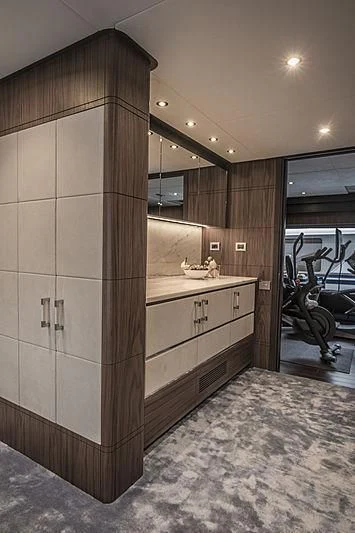 a large bathroom with a wood shower aboard JODI ANN Yacht for Charter