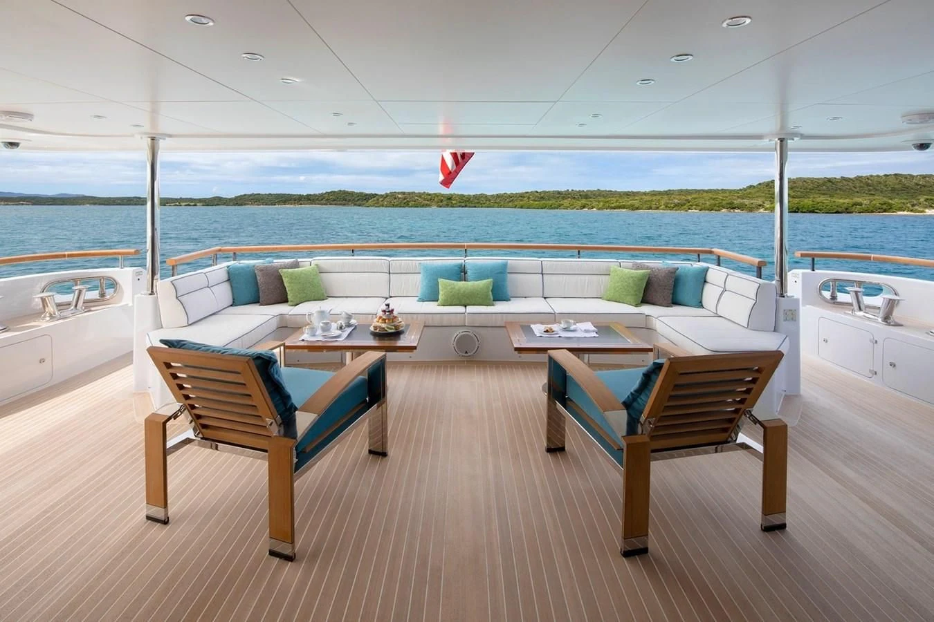 a room with a table and chairs aboard JODI ANN Yacht for Charter