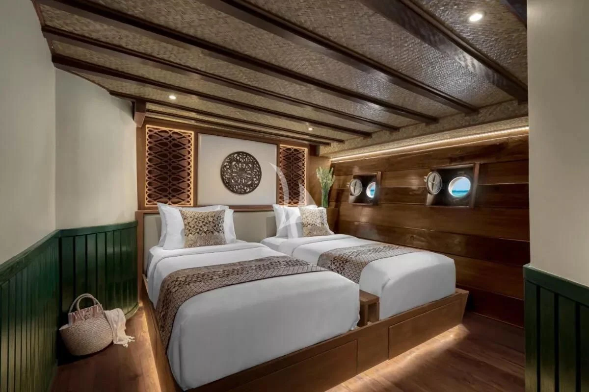 a room with two beds aboard SAMSARA SAMUDRA Yacht for Sale