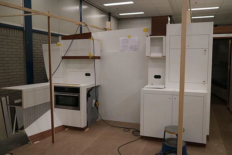 a room with white cabinets and a ladder aboard VAGRANT Yacht for Sale