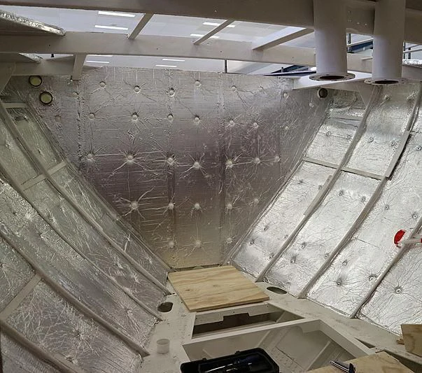 a large room with a large wall aboard VAGRANT Yacht for Sale