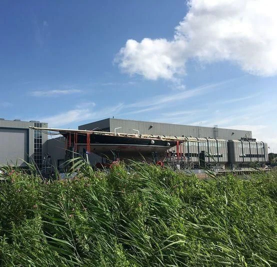 a building with a fence around it aboard VAGRANT Yacht for Sale