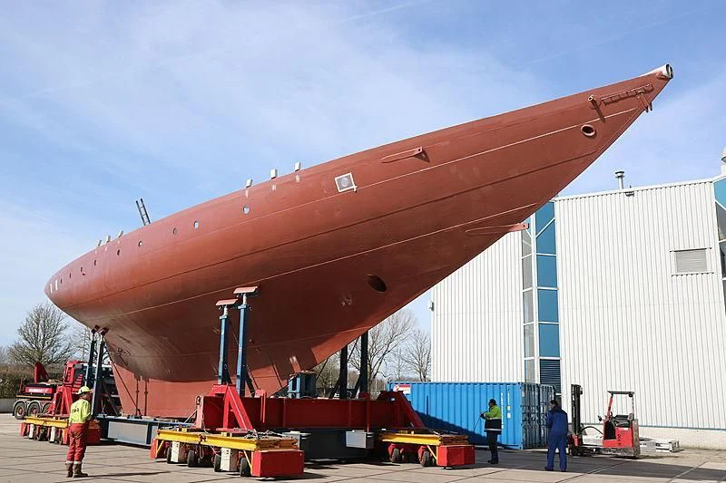 a large red and white missile aboard VAGRANT Yacht for Sale
