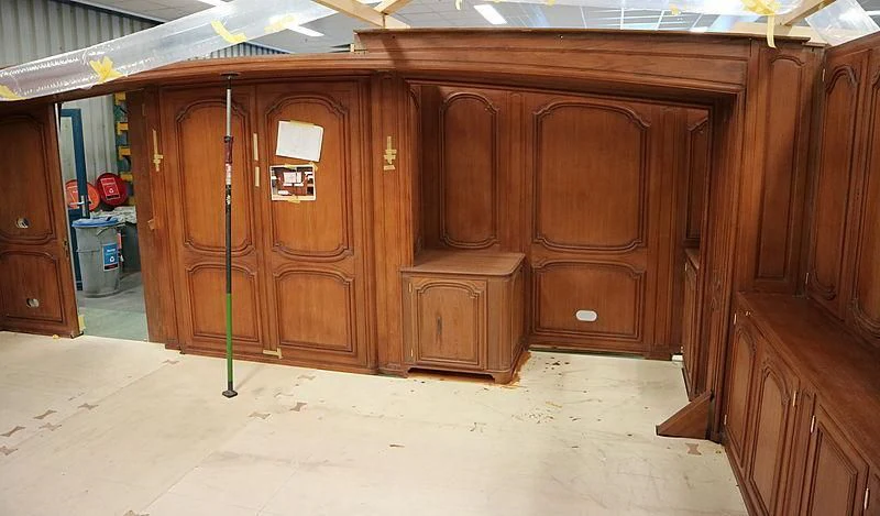 a wooden shed with wooden doors aboard VAGRANT Yacht for Sale