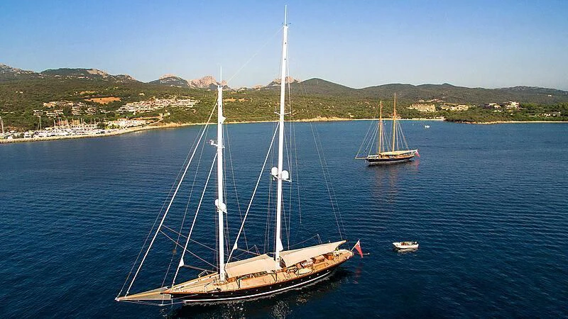 a couple of boats on the water aboard VAGRANT Yacht for Sale