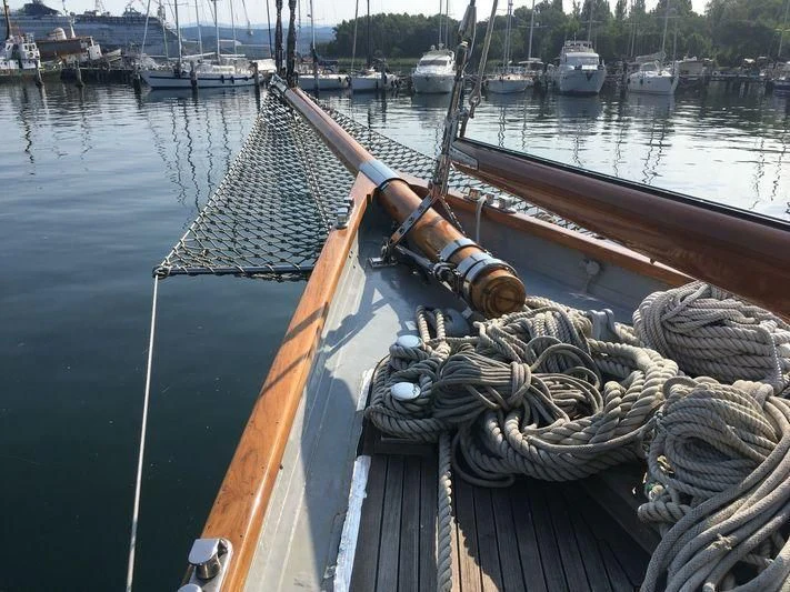 a boat with ropes tied to it aboard VAGRANT Yacht for Sale