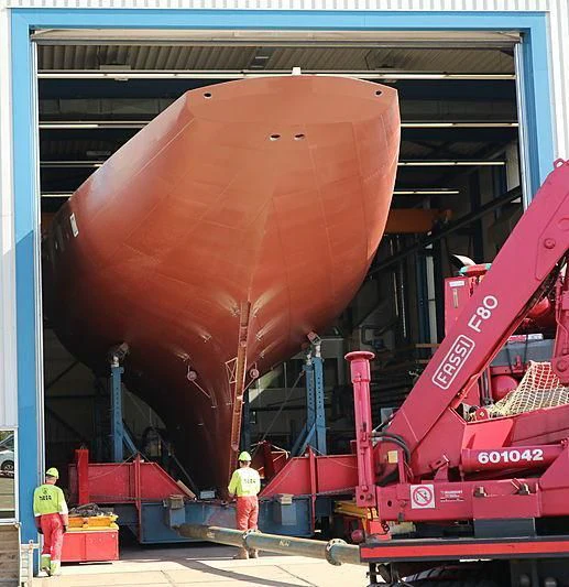 a large machine with a red frame aboard VAGRANT Yacht for Sale