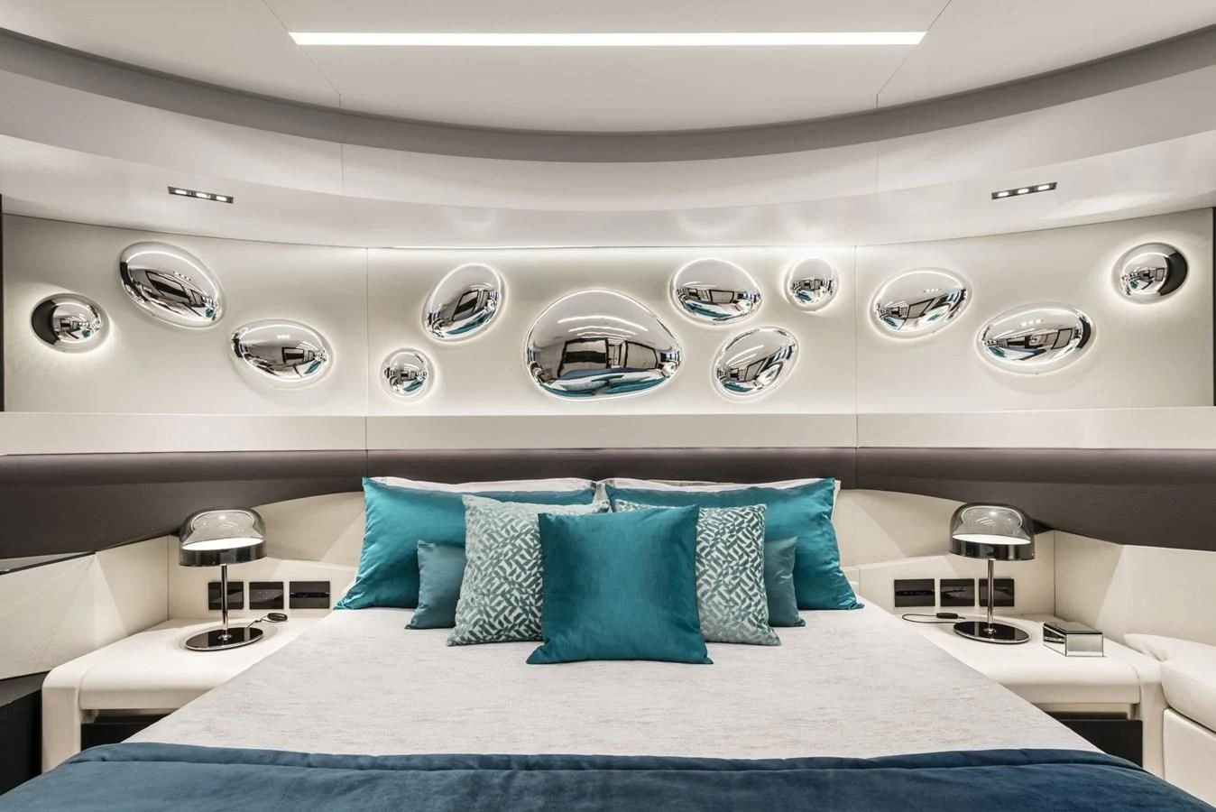 a room with a bed and a mirror aboard TOUCH ME Yacht for Sale
