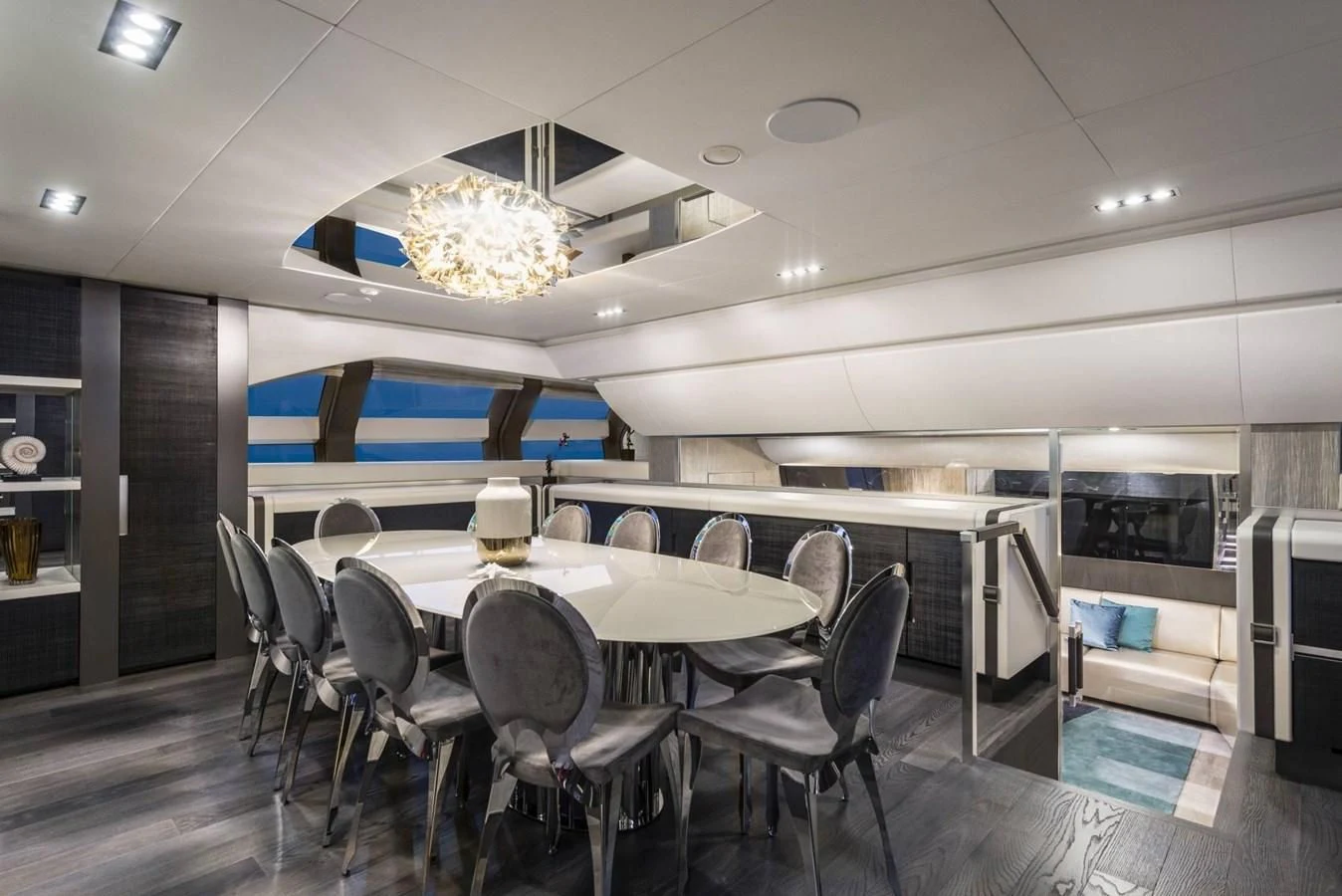 a room with a table and chairs aboard TOUCH ME Yacht for Sale