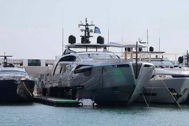 a large boat docked at a port aboard TOUCH ME Yacht for Sale