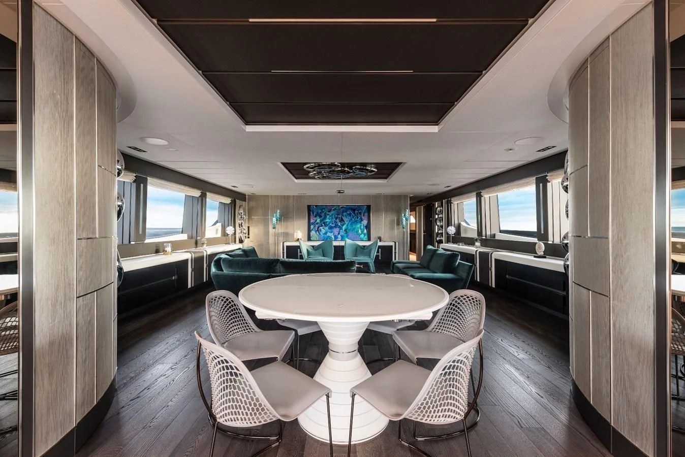 a room with a table chairs and a large window aboard TOUCH ME Yacht for Sale