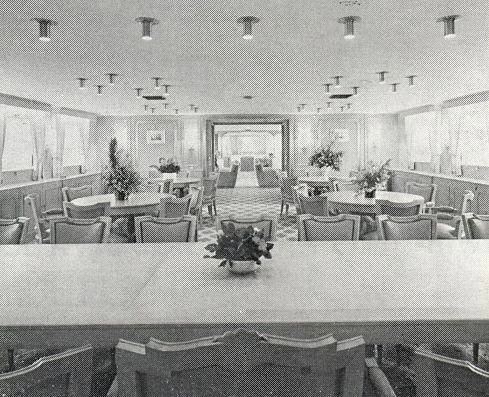 a room with tables and chairs aboard AL RIYADH Yacht for Sale