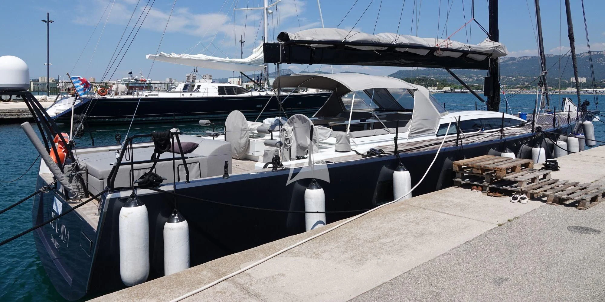 a boat docked at a pier aboard LUCE GUIDA Yacht for Sale