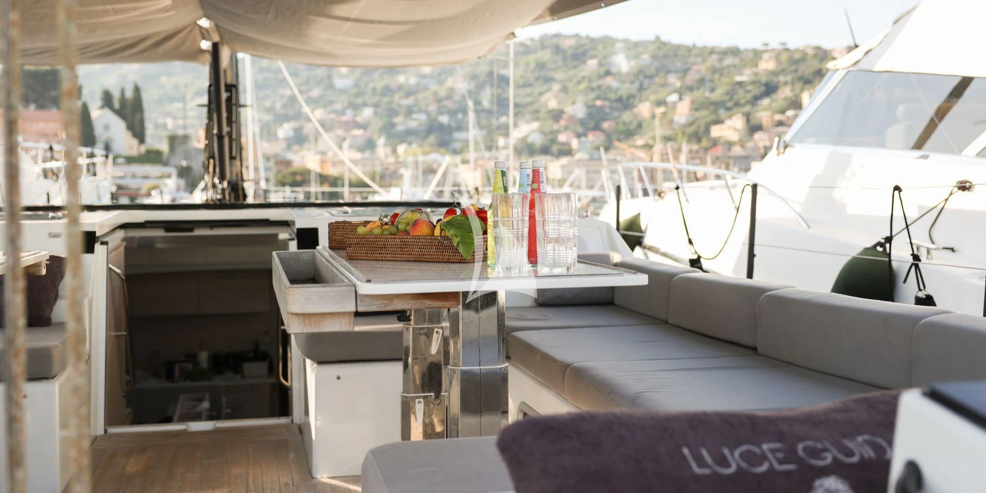a room with a table and chairs aboard LUCE GUIDA Yacht for Sale
