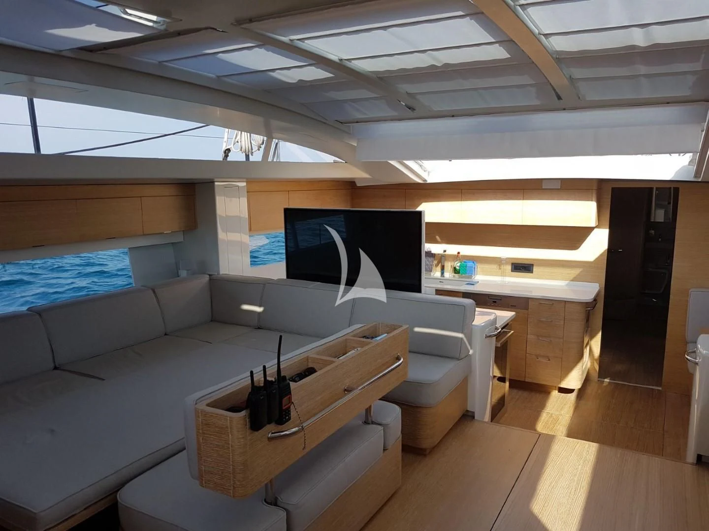 a room with a couch and a table aboard LUCE GUIDA Yacht for Sale