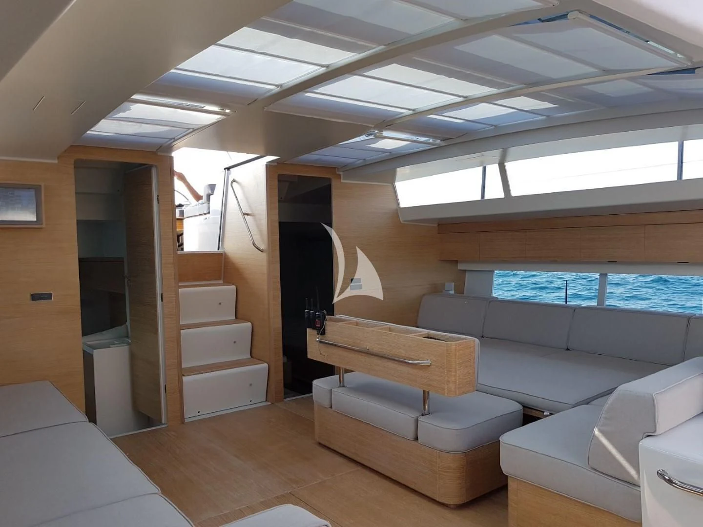 a room with a couch and a tv aboard LUCE GUIDA Yacht for Sale