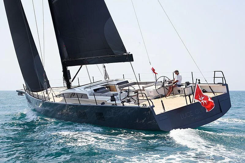 a couple of men sailing on a boat aboard LUCE GUIDA Yacht for Sale