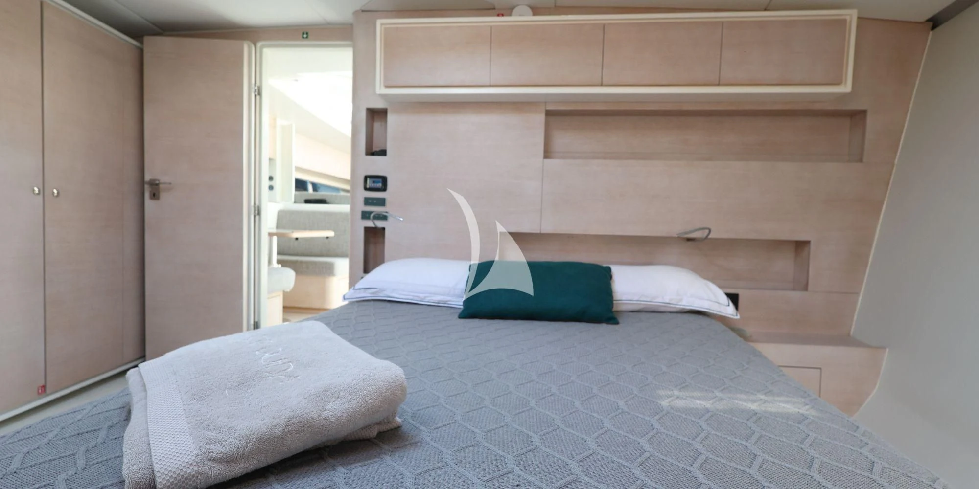 a bed with white sheets aboard LUCE GUIDA Yacht for Sale