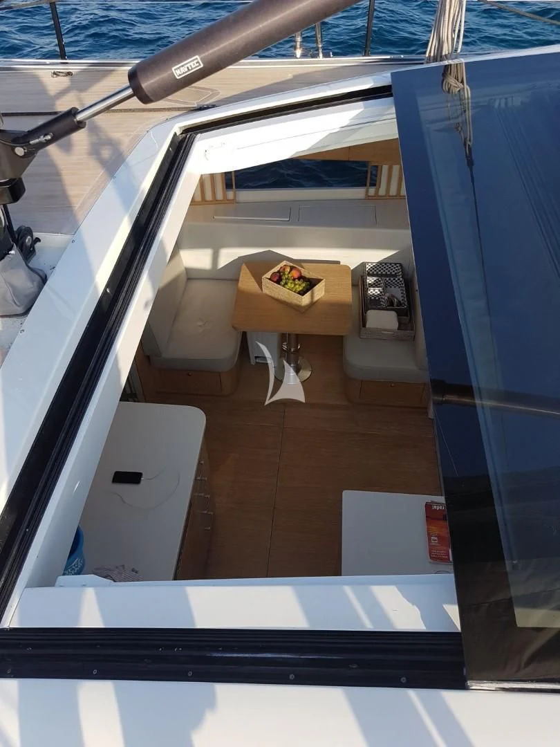 a boat with a table and chairs aboard LUCE GUIDA Yacht for Sale
