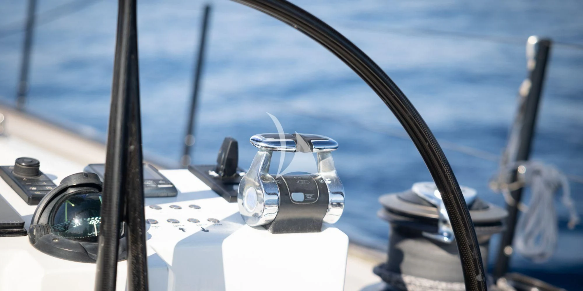 a steering wheel and dashboard of a boat aboard LUCE GUIDA Yacht for Sale