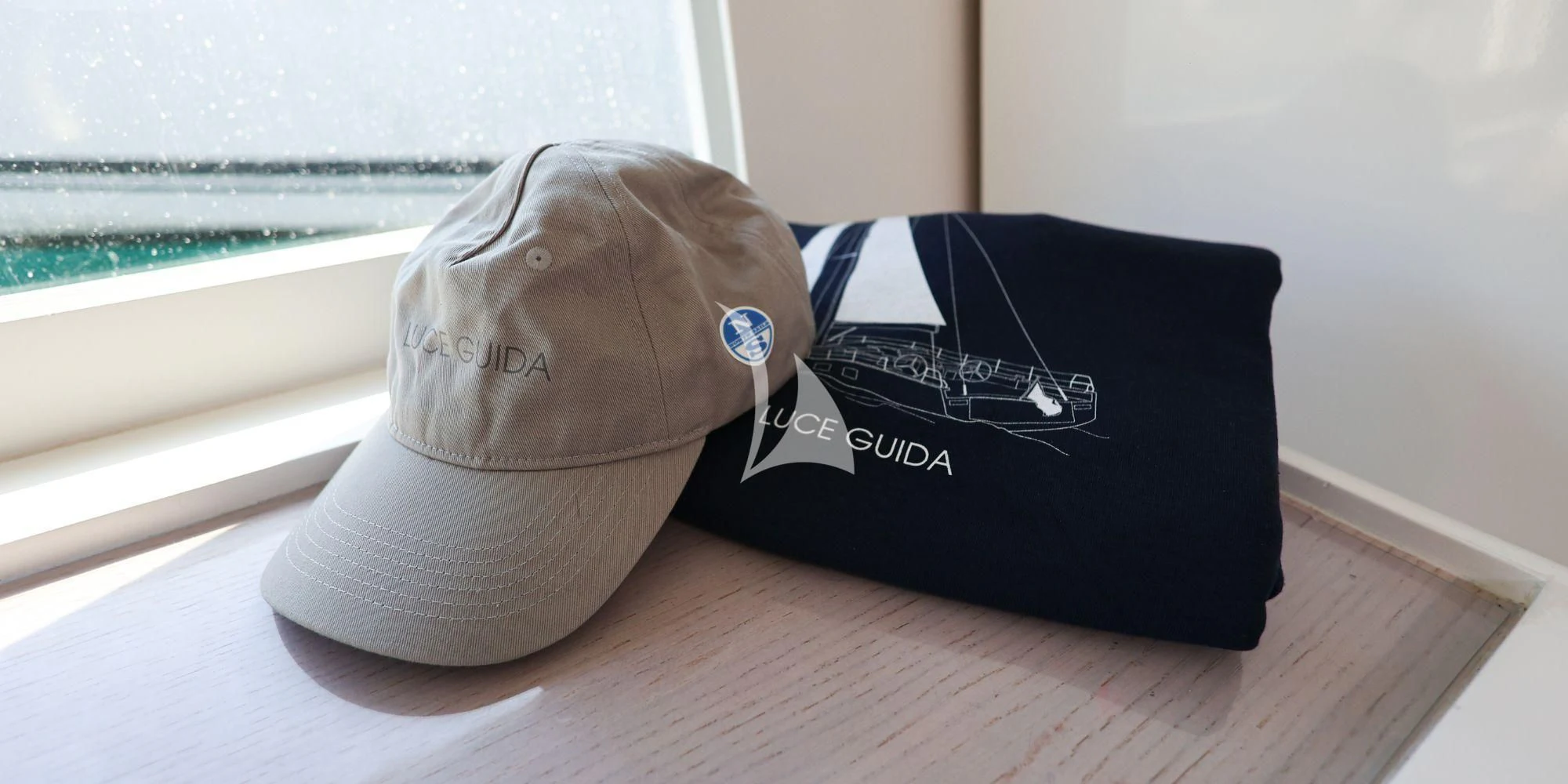two hats on a table aboard LUCE GUIDA Yacht for Sale