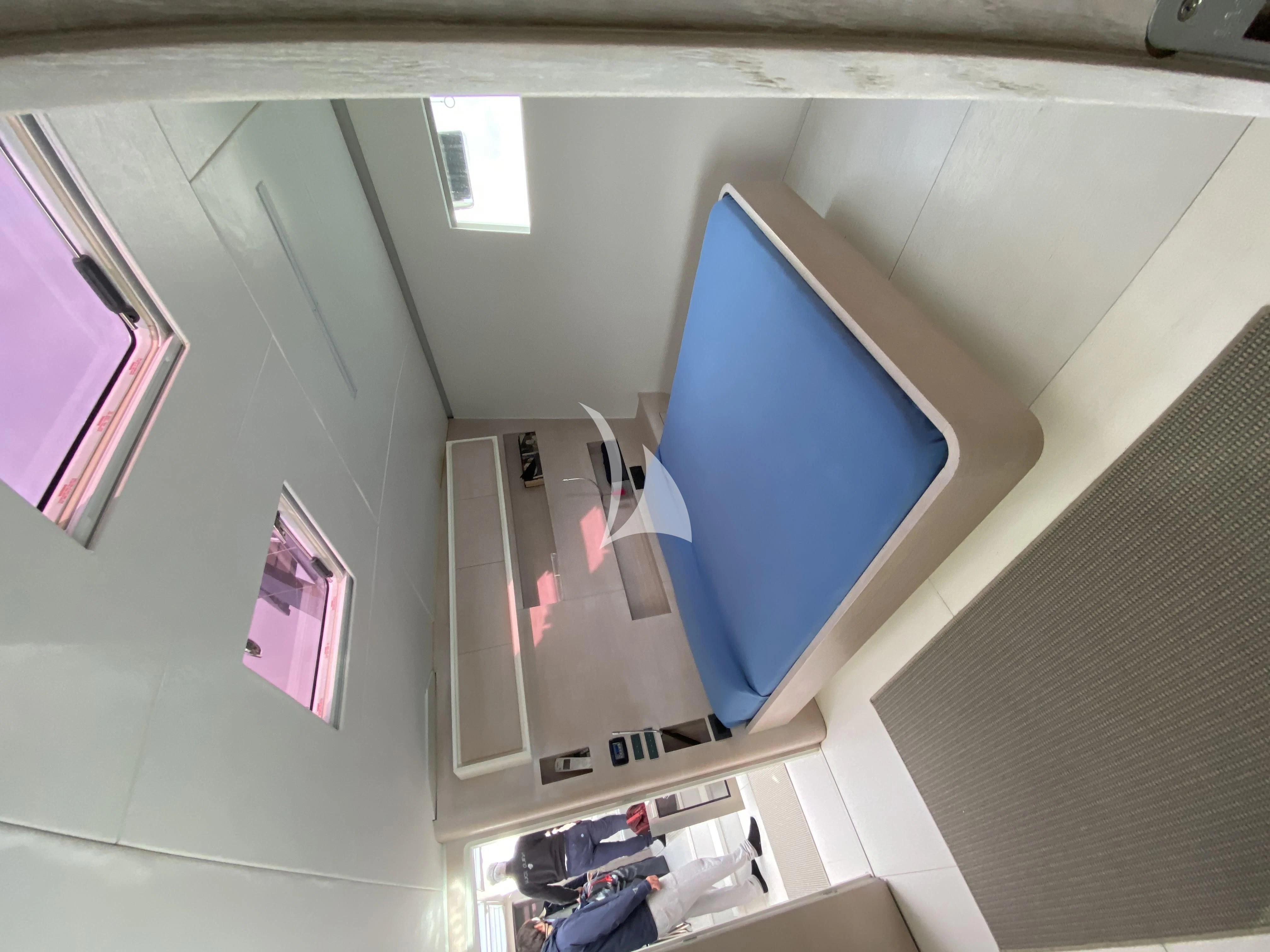 a room with a computer and a window aboard LUCE GUIDA Yacht for Sale
