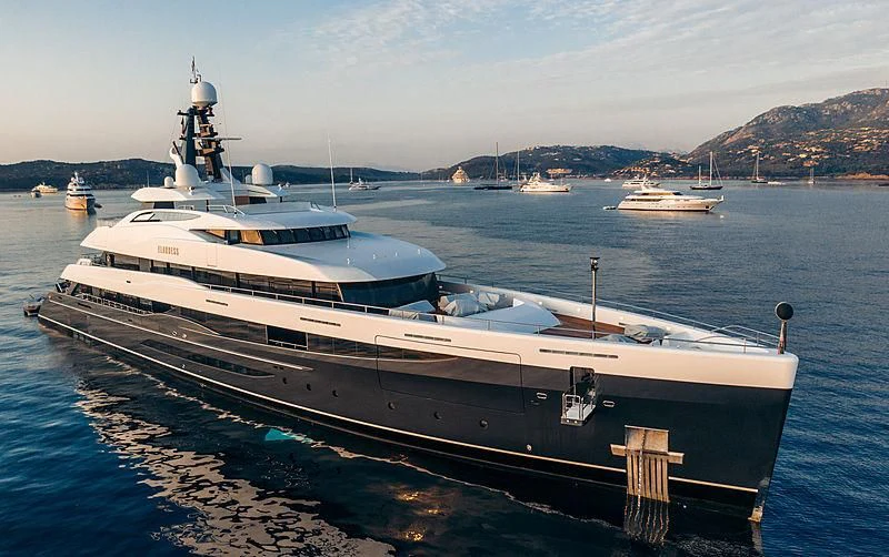 a large white yacht in the water aboard M'BRACE Yacht for Sale