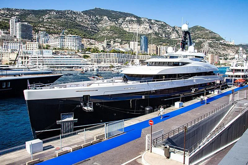 a large boat docked at a pier aboard M'BRACE Yacht for Sale