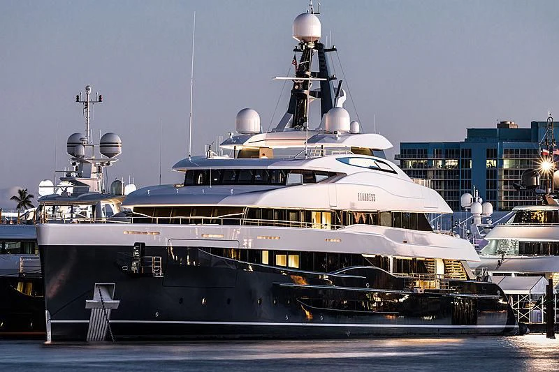 a large ship in a harbor aboard M'BRACE Yacht for Sale