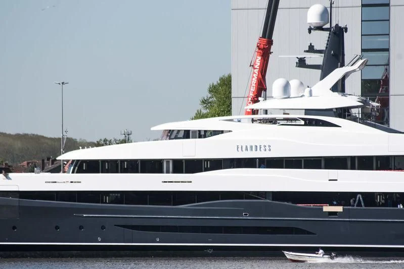 a white yacht in a dock aboard M'BRACE Yacht for Sale