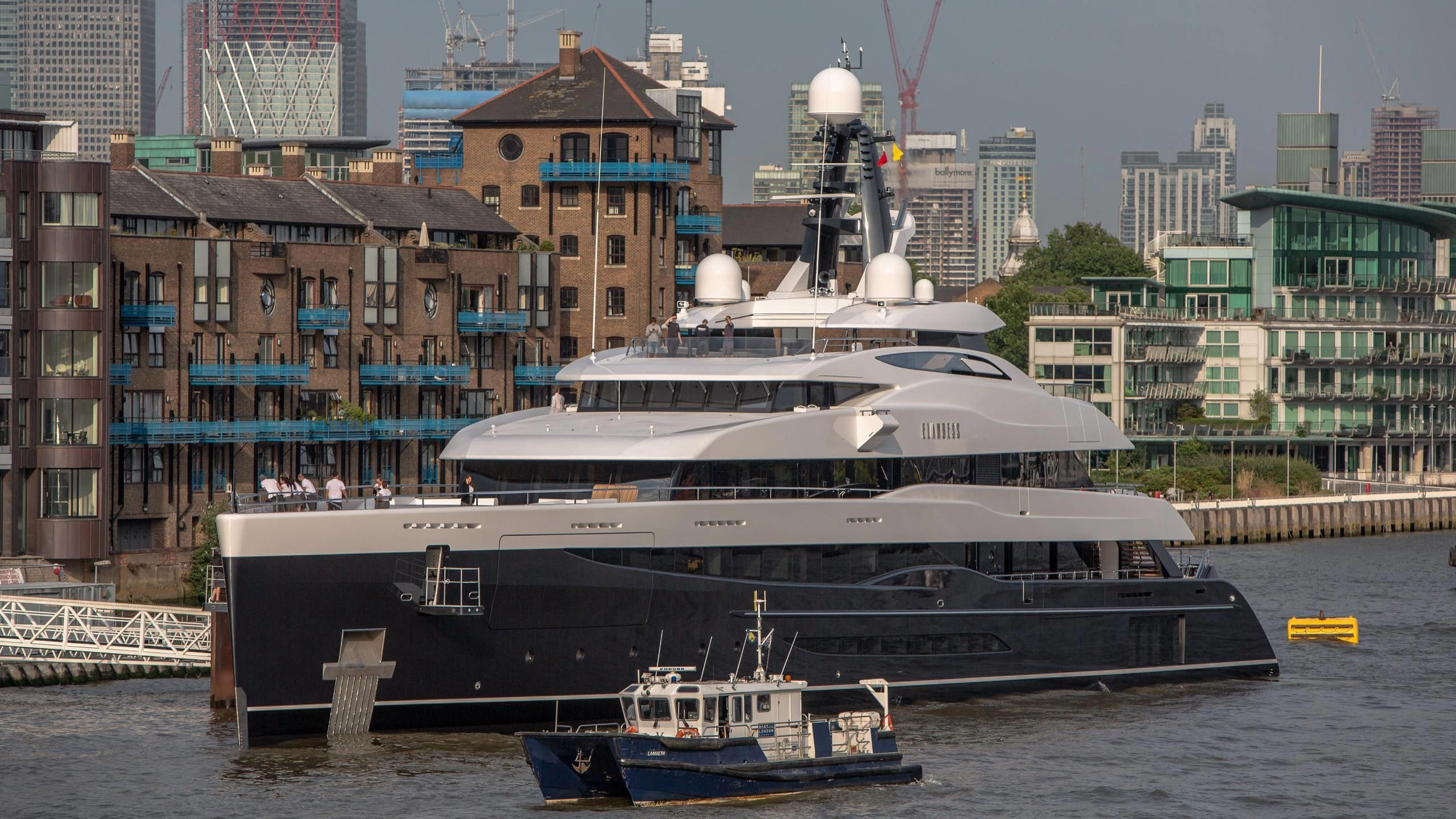 a large boat is parked in the water aboard M'BRACE Yacht for Sale