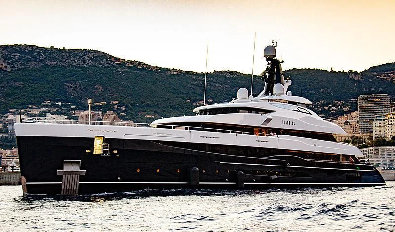 a large ship in the water aboard M'BRACE Yacht for Sale