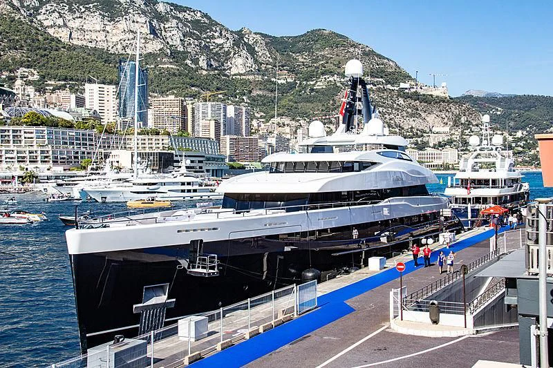 a large ship docked at a pier aboard M'BRACE Yacht for Sale