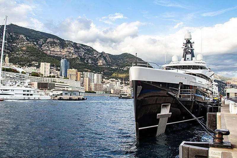 a large ship docked at a pier aboard M'BRACE Yacht for Sale
