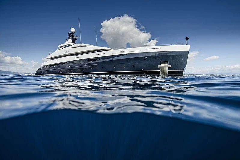 a large white ship in the water aboard M'BRACE Yacht for Sale