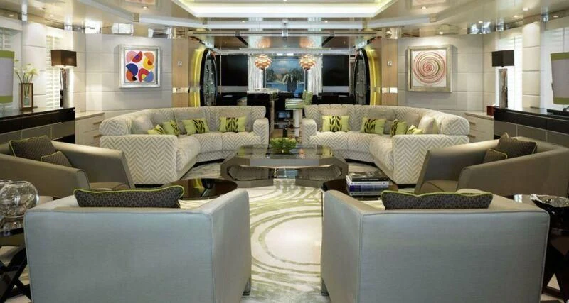 a living room with a large window aboard M'BRACE Yacht for Sale